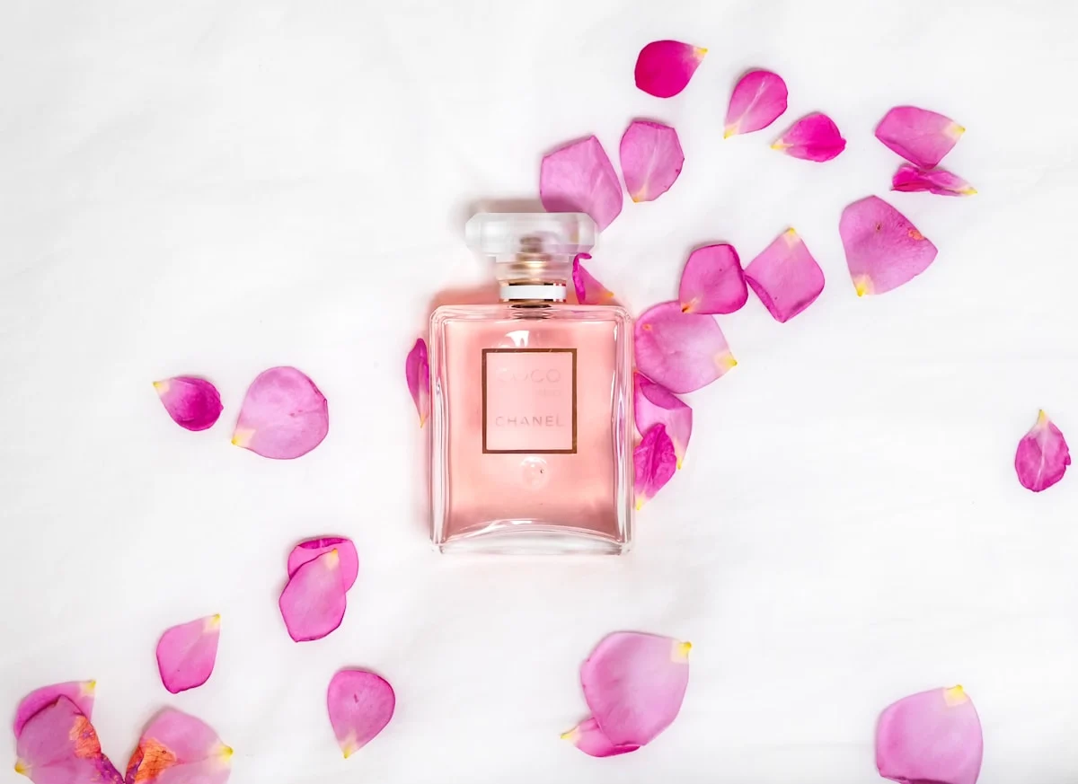 Perfume and fragrance glass packaging with floral presentation