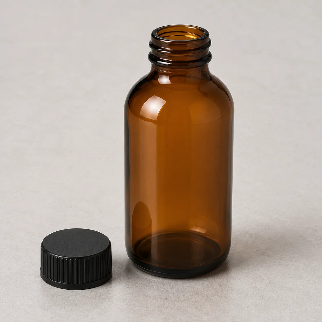 Angled side view of Amber Glass Apothecary Bottle showing the outer profile