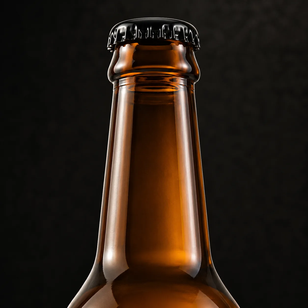 Close view of Amber Glass Cider Bottle showing closure area and print / coat / label