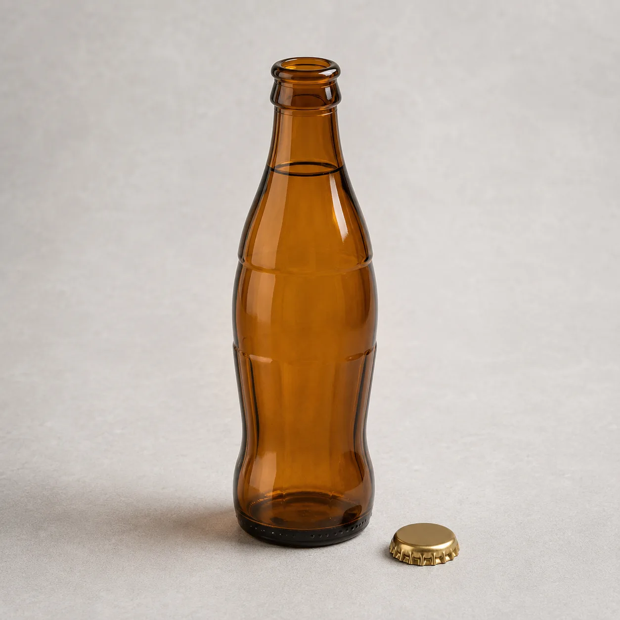 Angled side view of Amber Glass Soft Drink Bottle showing the outer profile