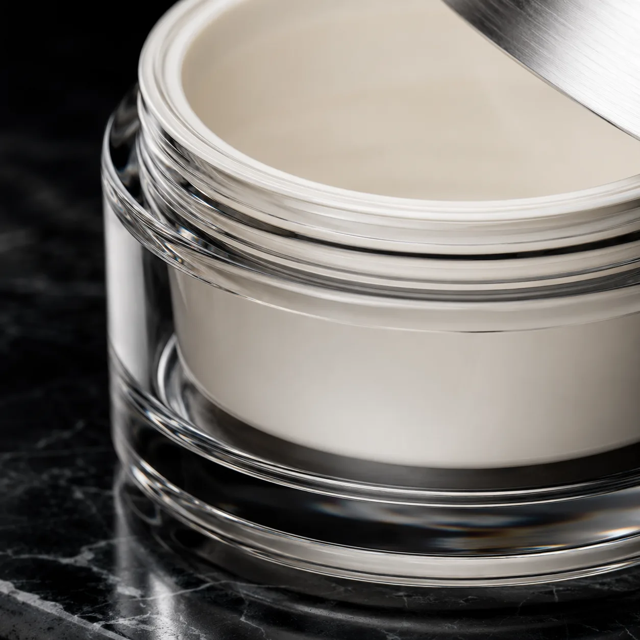 Close view of Glass Face Mask Jar showing closure area and print / coat / label