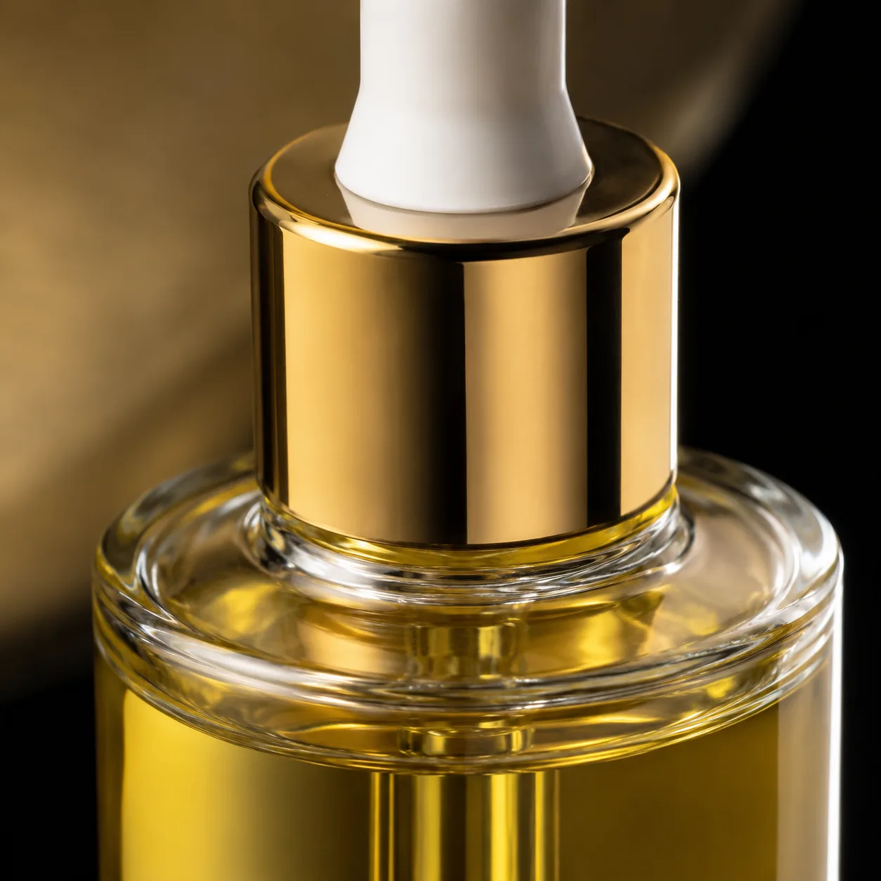 Close view of Glass Facial Oil Bottle showing closure area and print / coat / label