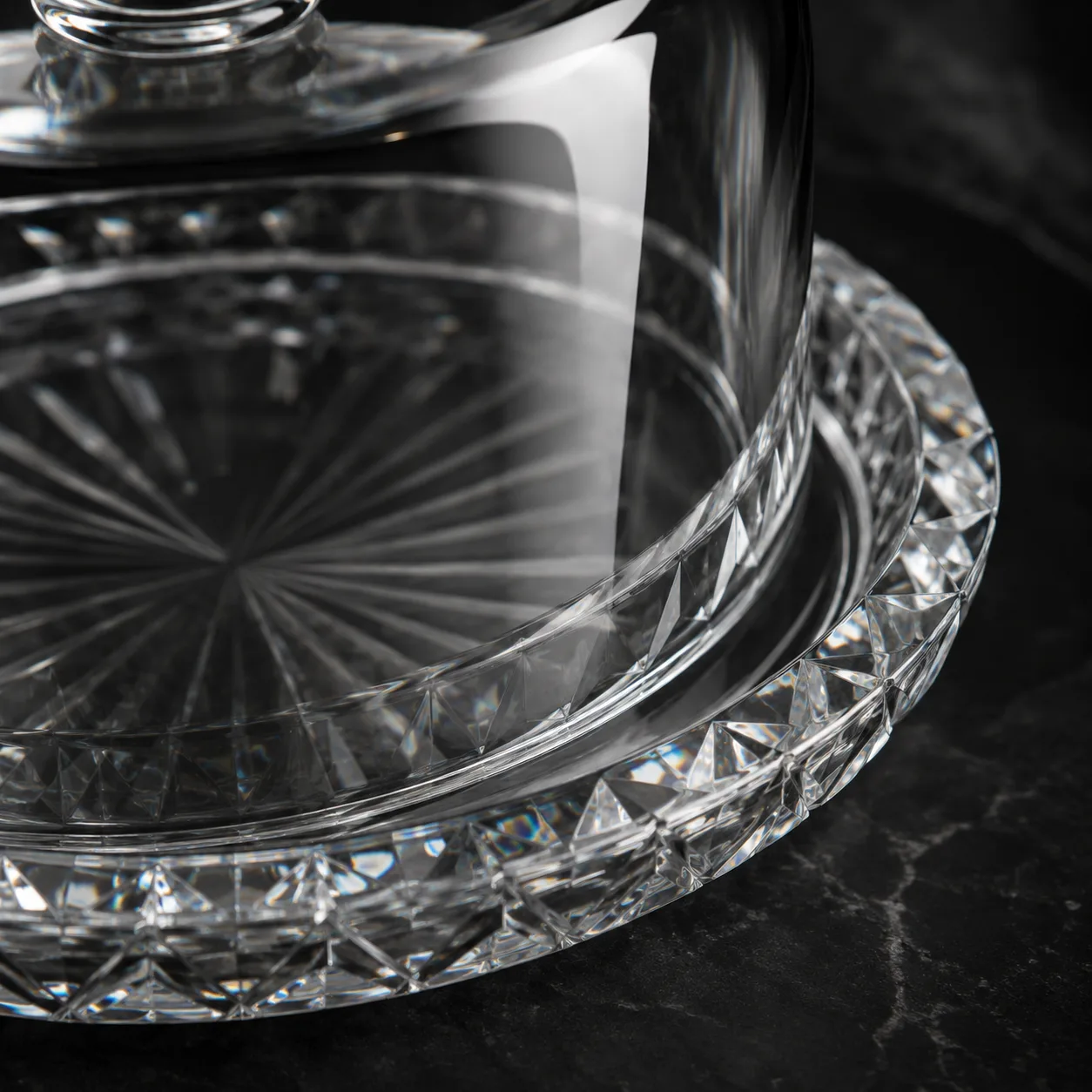 Close view of Cut Glass Cloche showing base detail and faceted surface detail