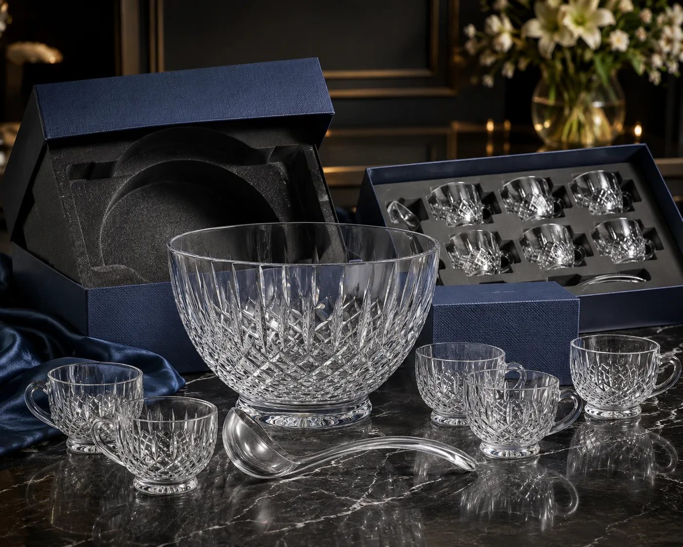 Close-up of Cut Glass Punch Bowl showing the rim, base and faceted detail.