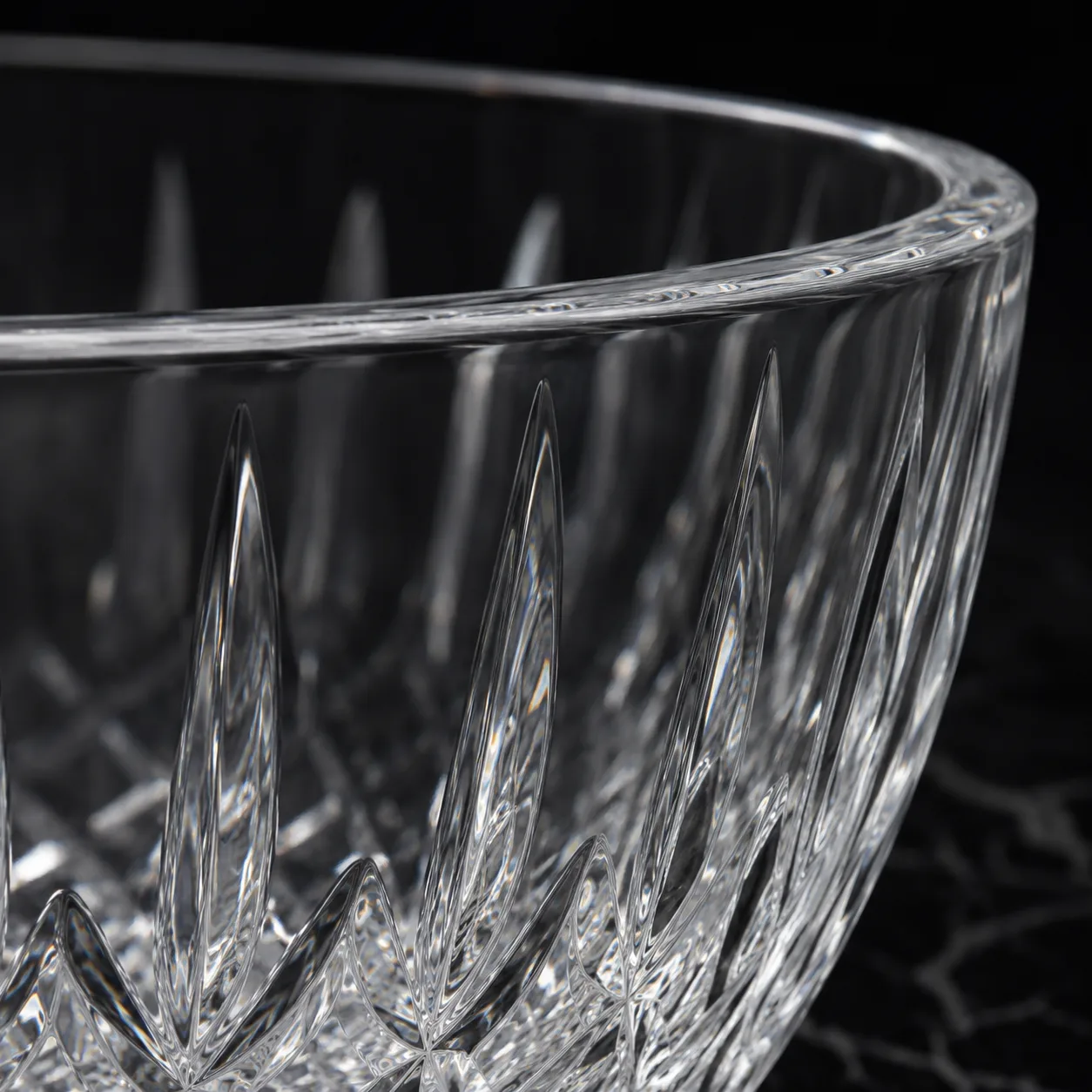 Close view of Cut Glass Punch Bowl showing base detail and faceted surface detail