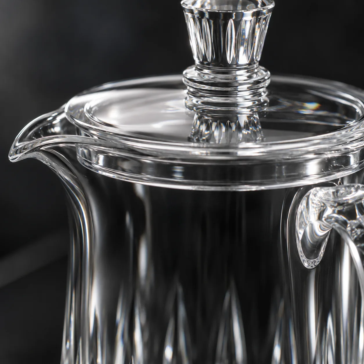 Close view of Cut Glass Water Pitcher showing base detail and faceted surface detail