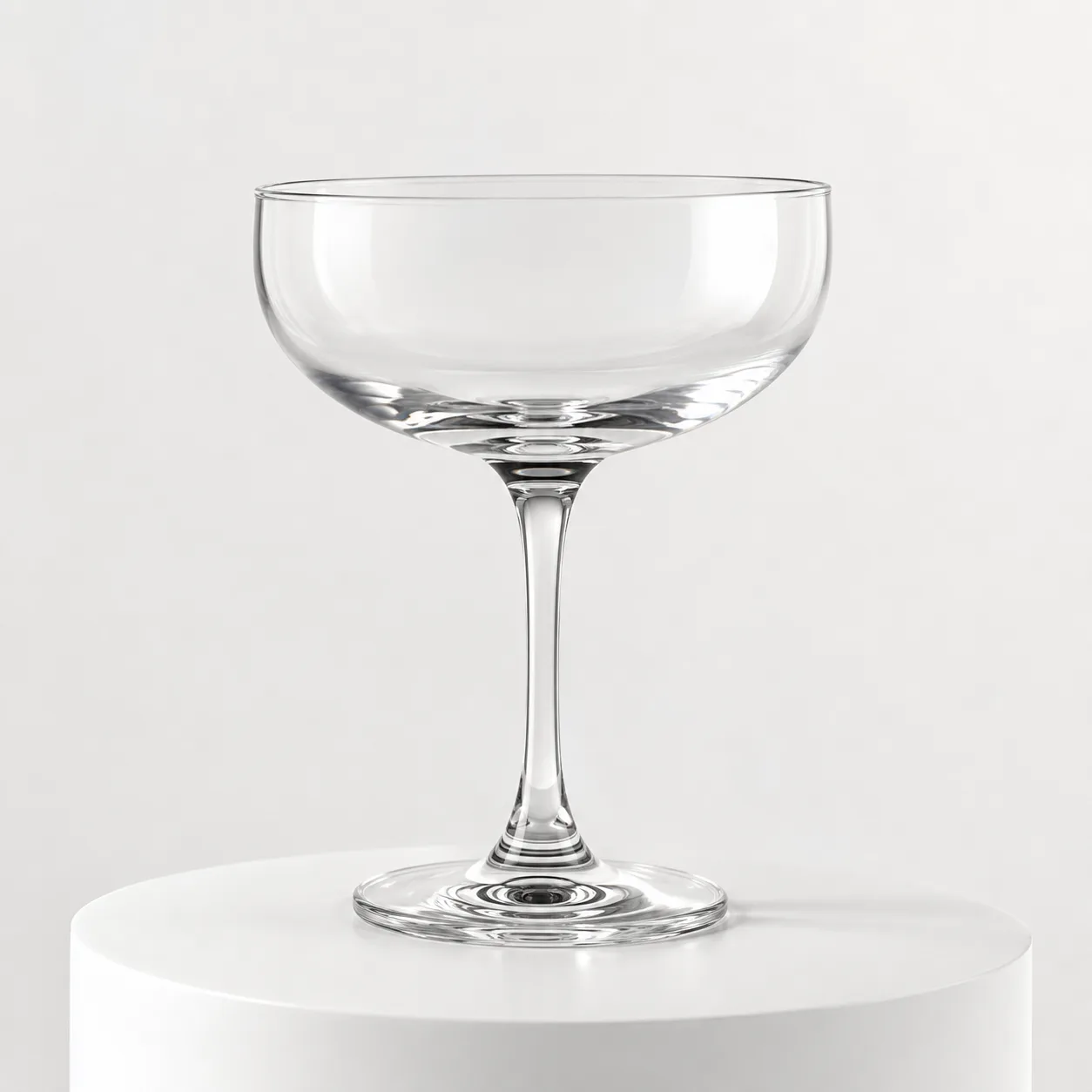 Champagne Coupe Glass front view with visible champagne coupe glass profile
