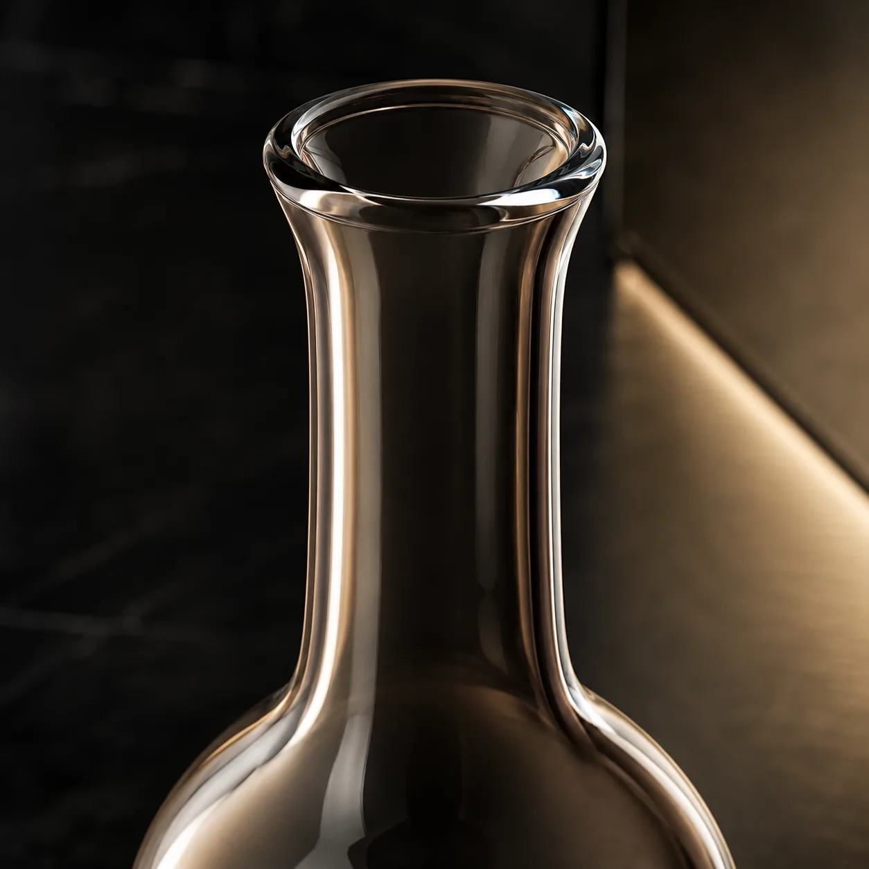 Close view of Glass Bottle-Shaped Vase showing base area and color / frost finish