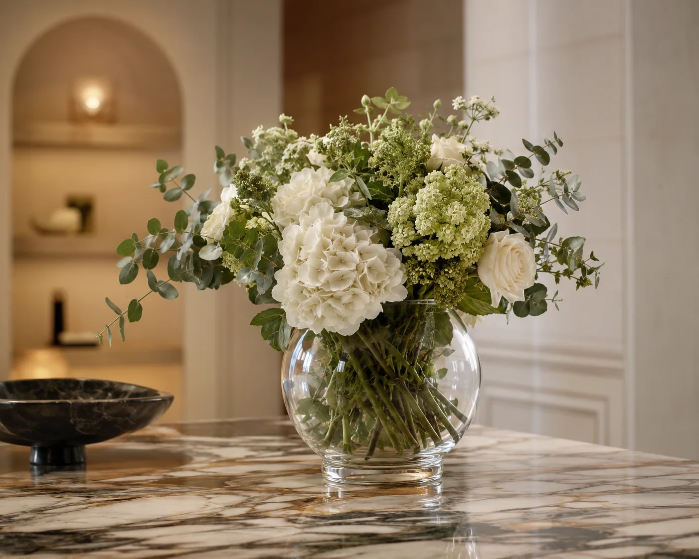 Glass Fish Bowl Vase in a decorative floral setting for floating flowers and centerpieces.