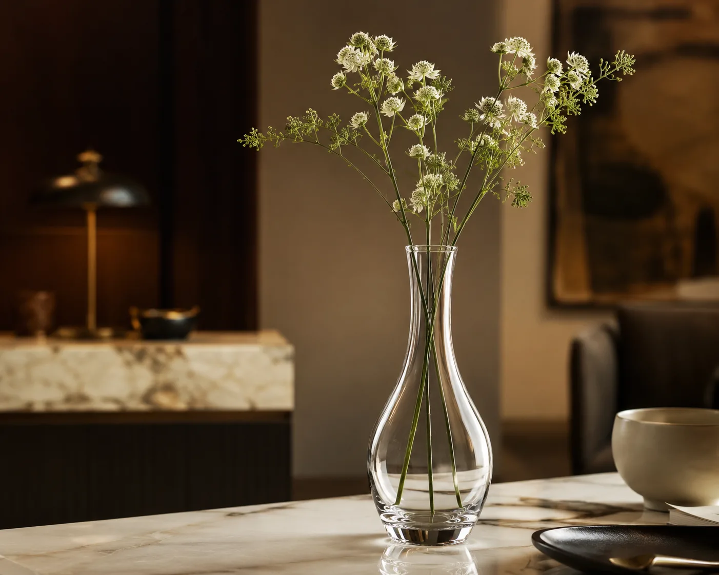 Glass Narrow-Neck Vase in a decorative floral setting for single stems and controlled floral arrangements.