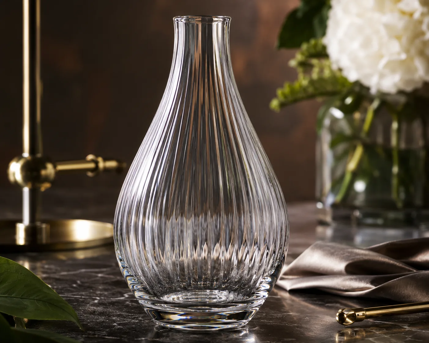 Glass Teardrop Vase in a coordinated tabletop or interior display.