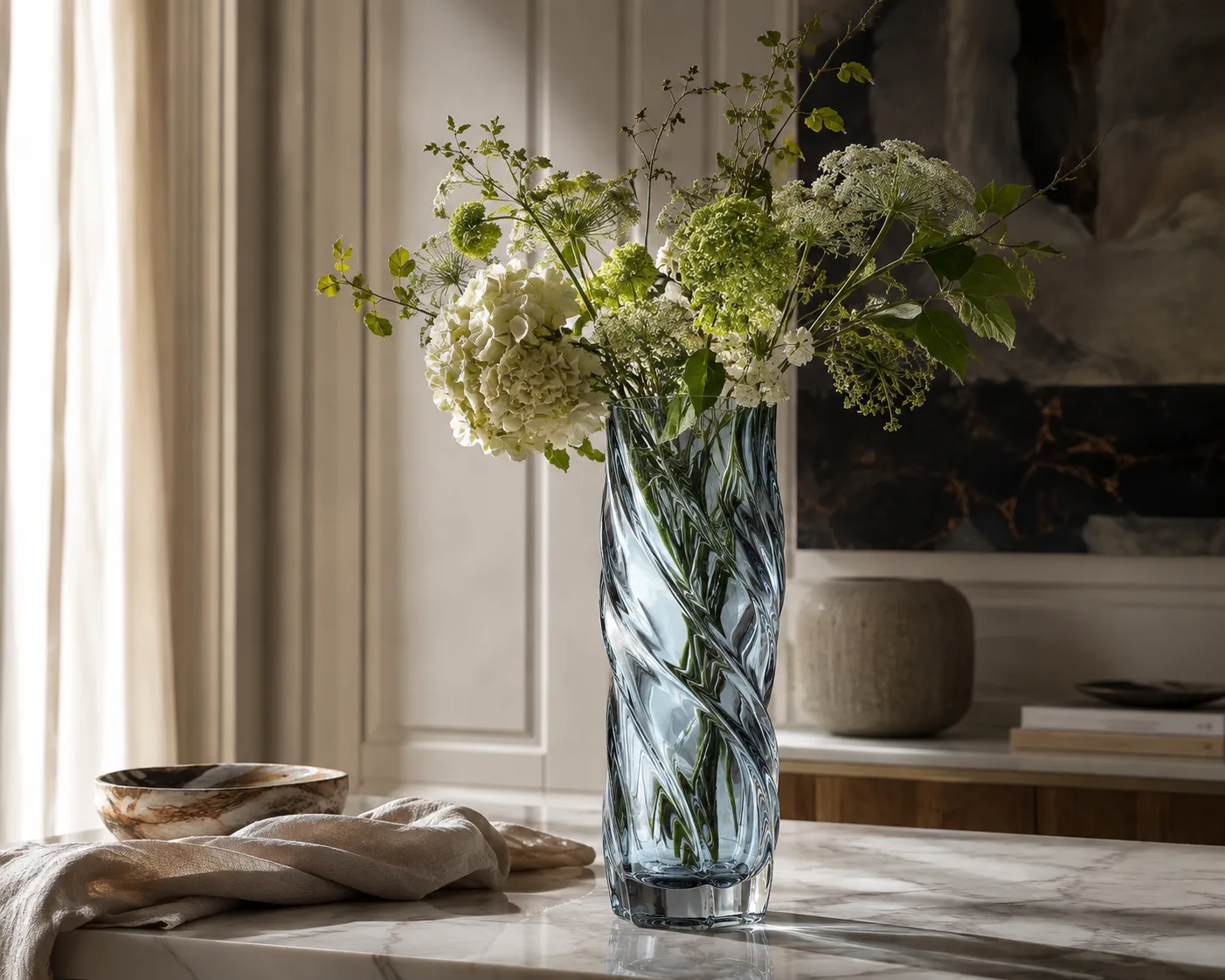 Glass Twisted Vase in a decorative floral setting for floral arrangements and sculptural interior decor.