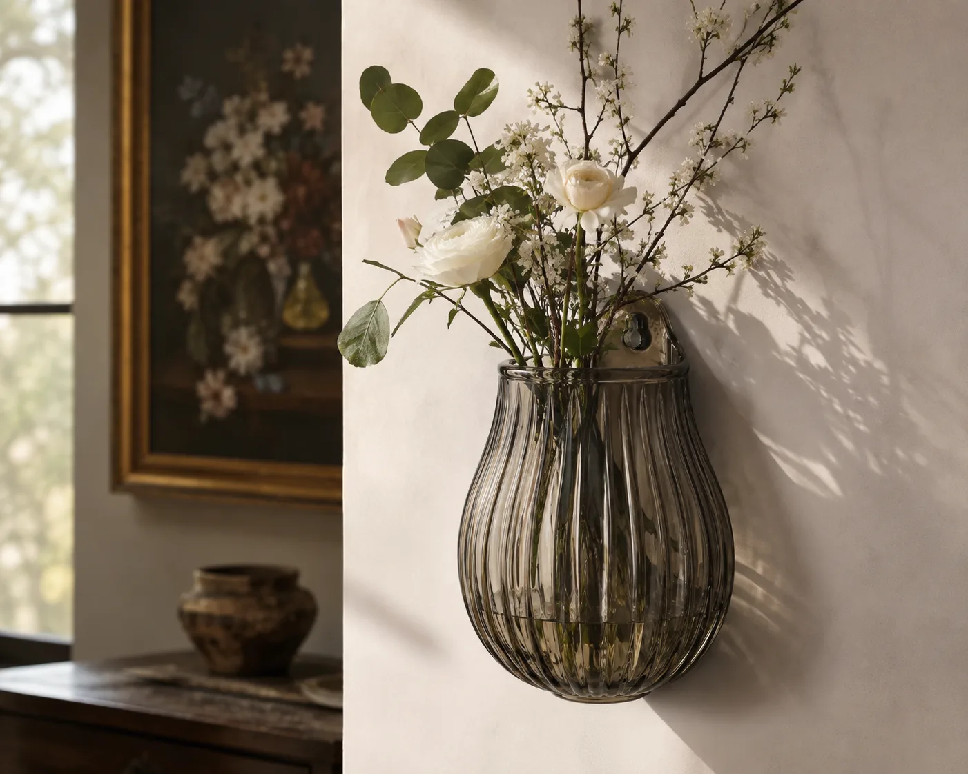 Glass Wall-Hanging Vase in a decorative floral setting for wall-mounted plants and compact floral display.