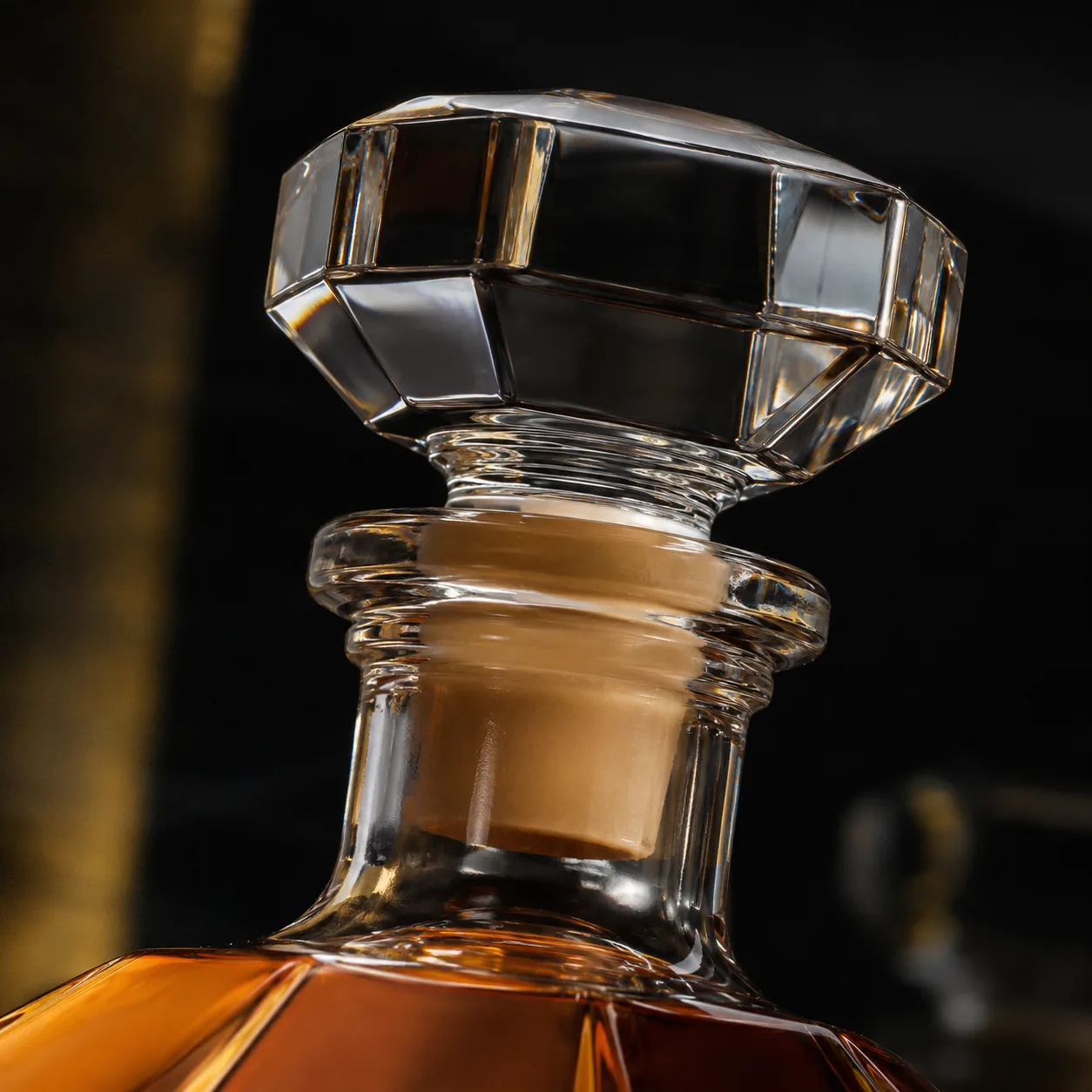 Close view of Faceted Liquor Bottle showing shoulder shape and faceted surface detail