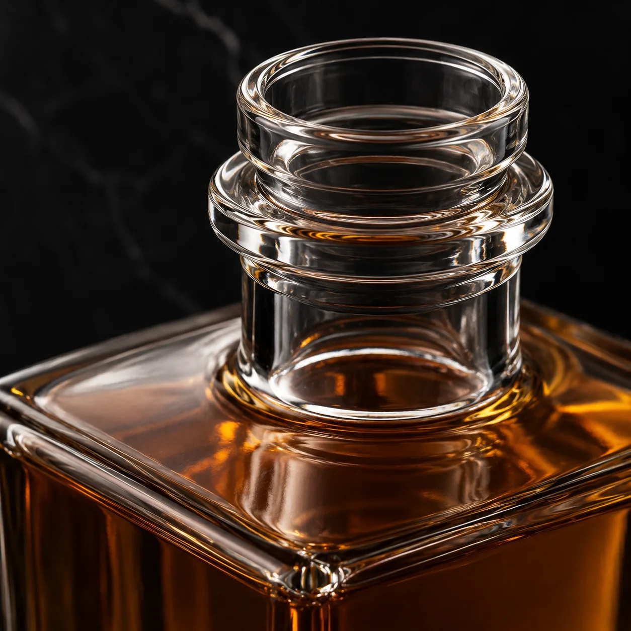 Close view of Square Whiskey Bottle showing shoulder shape and label / embossing