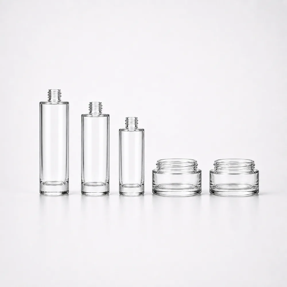 Cylindrical Serum Bottle and Cream Jar Set with pump, dropper and cream jar lid - front view