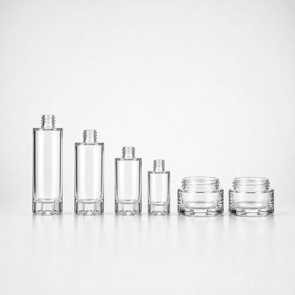 Grid Bottom Skincare Bottle and Jar Set with pump, dropper and cream jar lid - front view