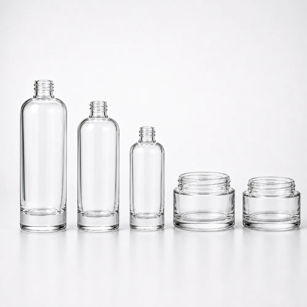 Rounded Shoulder Skincare Bottle and Jar Set with pump, dropper and cream jar lid - front view
