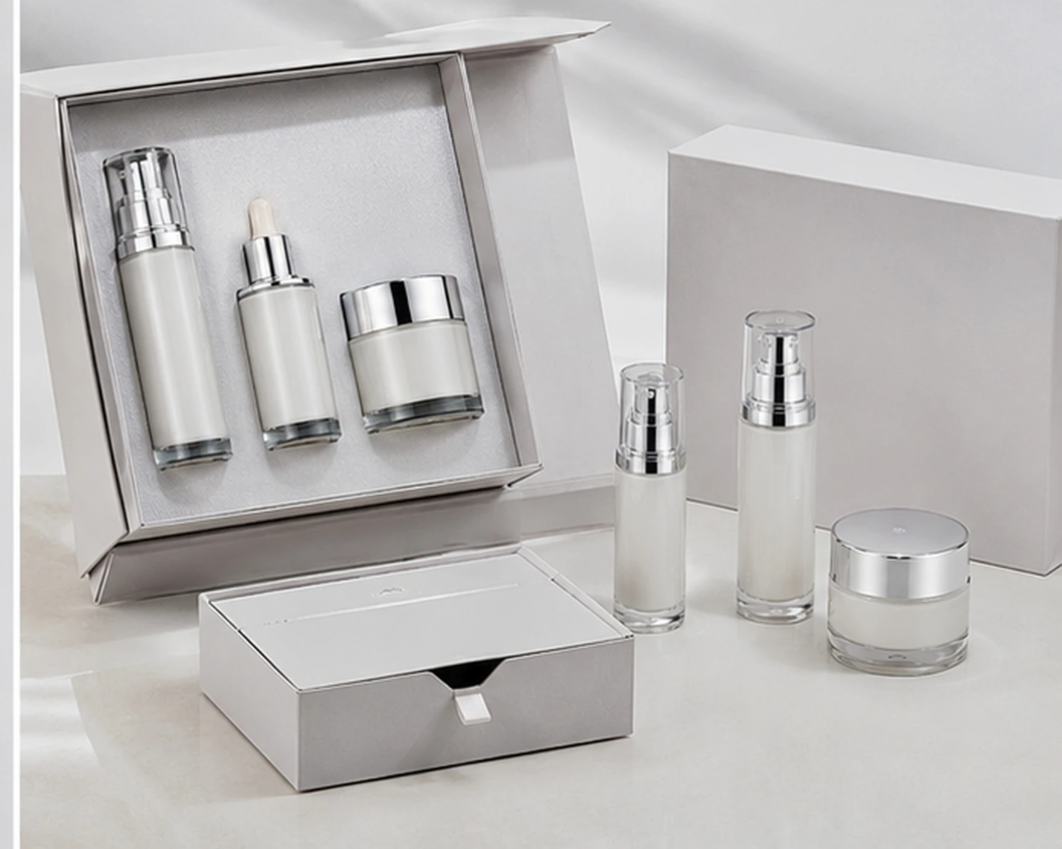 gift box packaging image of Cylindrical Serum Bottle and Cream Jar Set showing premium cosmetic retail box presentation