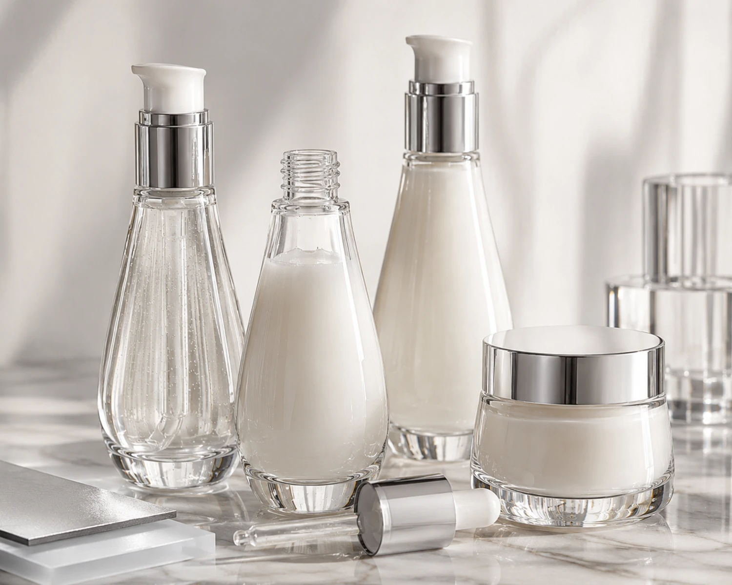 decoration process detail image of Tapered Shoulder Serum Bottle and Cream Jar Set showing finish, bottle detail or surface treatment
