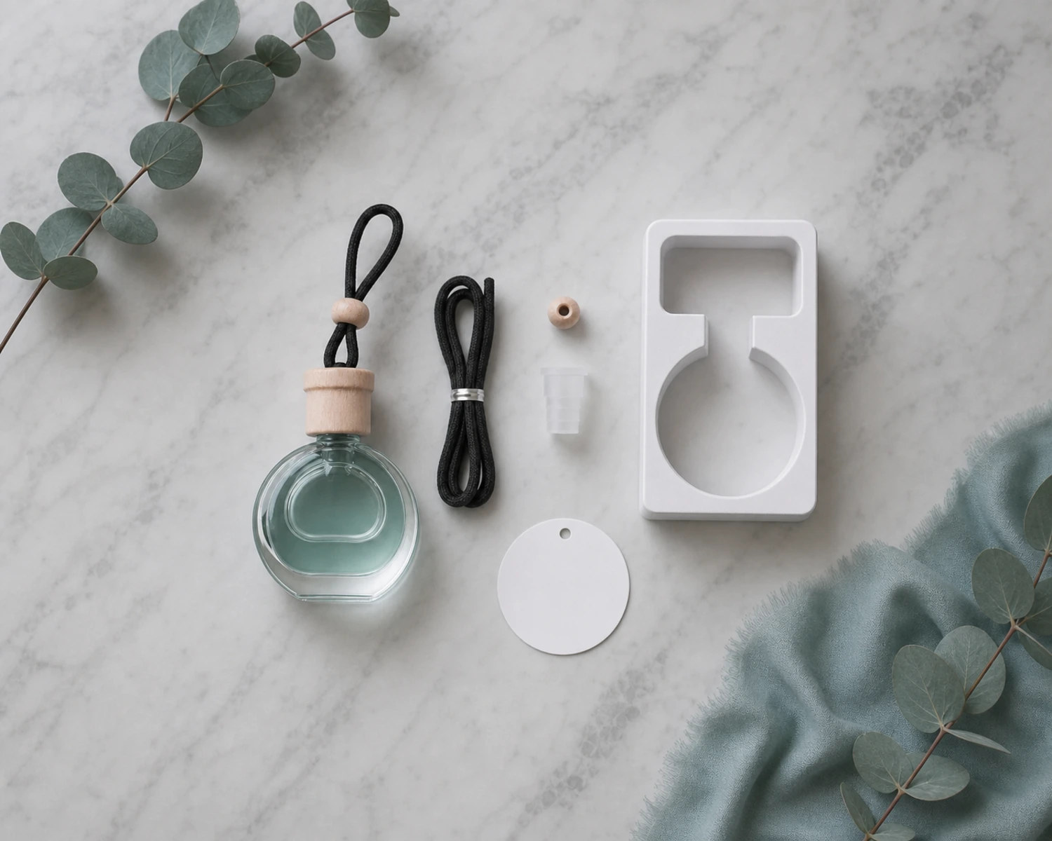 accessory detail image of Round Car Diffuser Bottle showing closure, label and packaging components