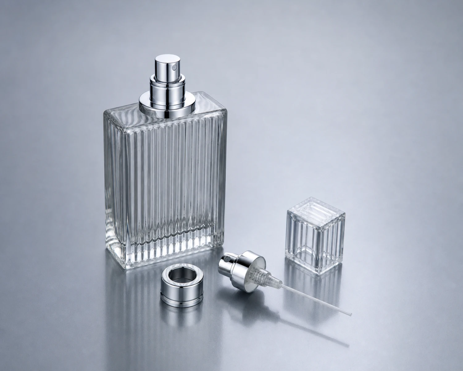 Fluted Perfume Bottle sprayer cap and accessory detail for custom glass fragrance packaging