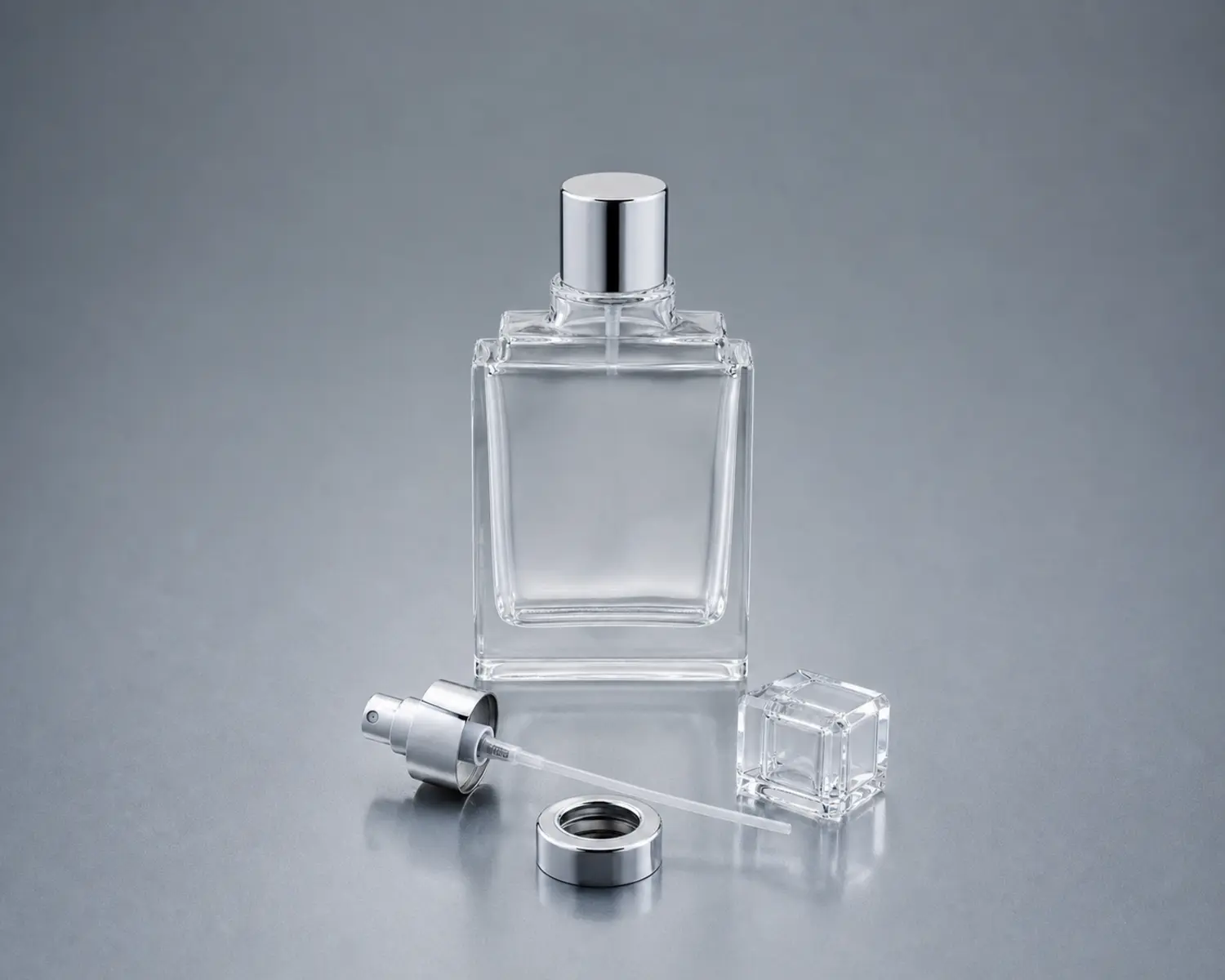 Stepped Shoulder Perfume Bottle sprayer cap and accessory detail for custom glass fragrance packaging